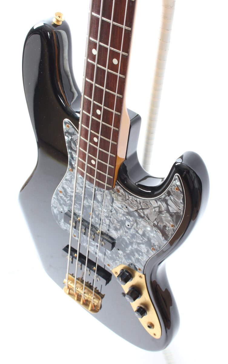 1998 Fender Jazz Bass 62 Reissue black matching headstock